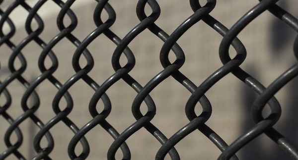 close up of a black chain-link fence