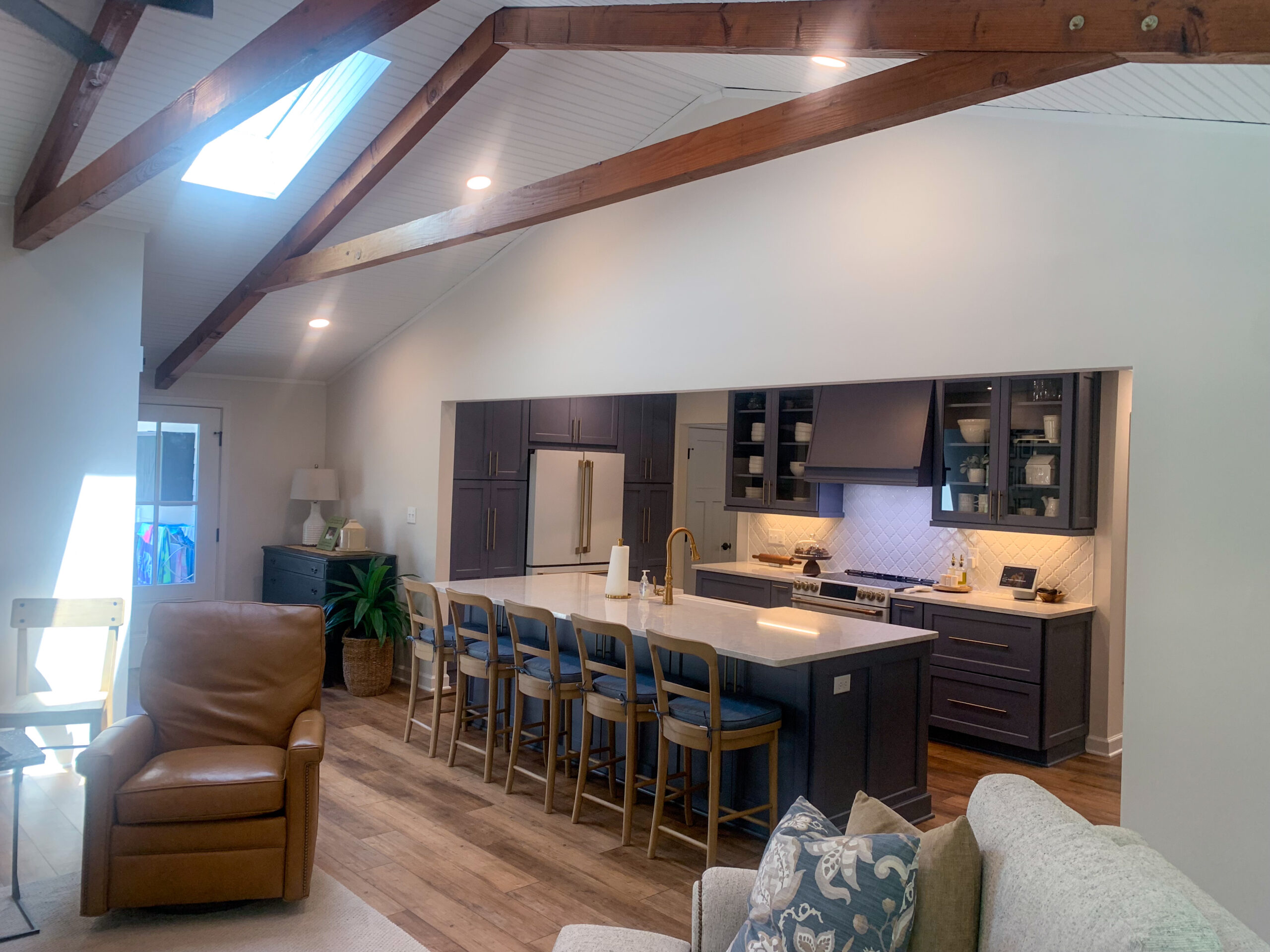 view from a remodeled living room to a remodeled kitchen