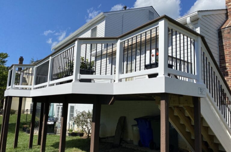 large white deck installed at the back of a residential home